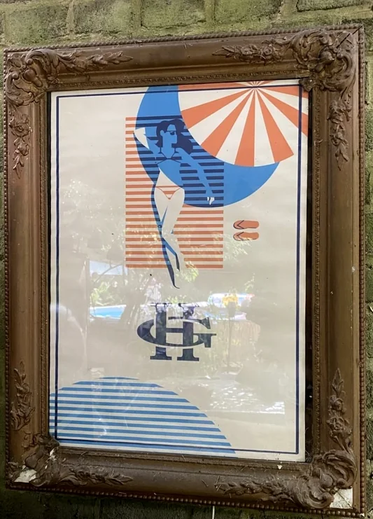 Vintage Hermanns Garden print with a sun umbrella, swimmer and HG monogram